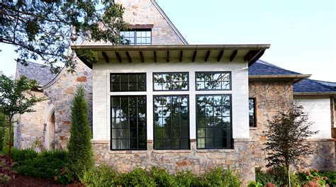 black metal windows front of house|modern black windows.